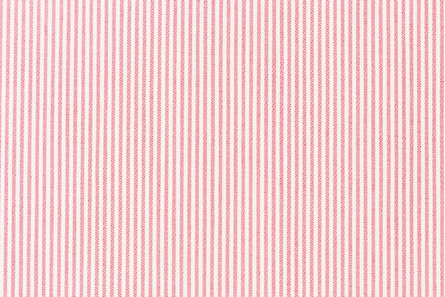 Linea a strisce rossa su sfondo con texture tessuto bianco