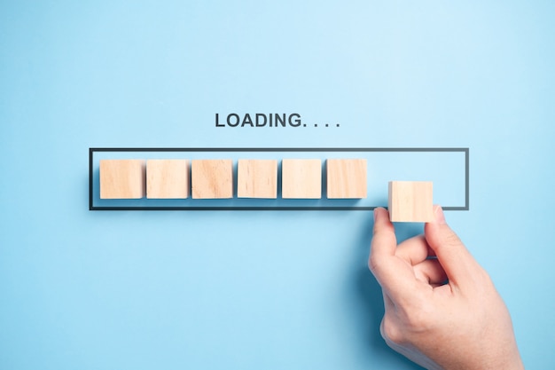 Loading bar with wooden blocks isolated 