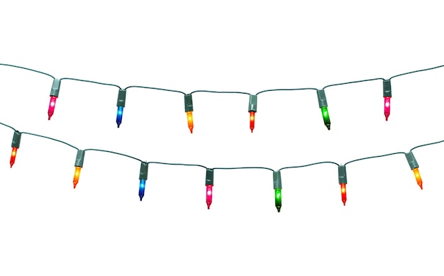 Low angle view of multi colored flags hanging against white background