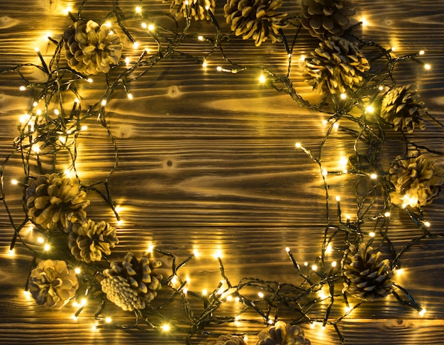 Luce di Natale su sfondo in legno Vista dall'alto con Copyspace