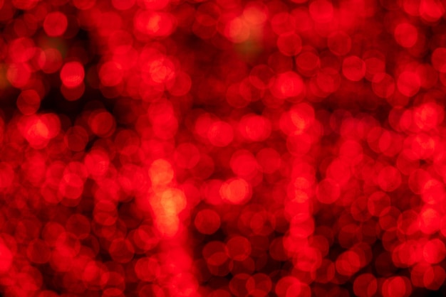 luce rossa del bokeh della sfuocatura astratta per lo sfondo