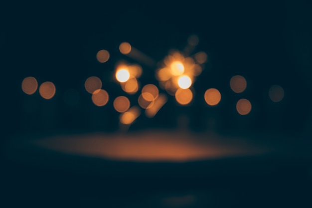 Luci bokeh astratte su sfondo scuro
