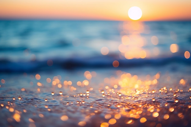 Luci sfocate della spiaggia di Bokeh al tramonto