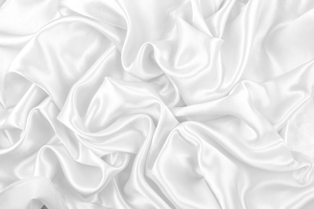 Lussuoso di seta bianca liscia o sfondo trama del tessuto di raso