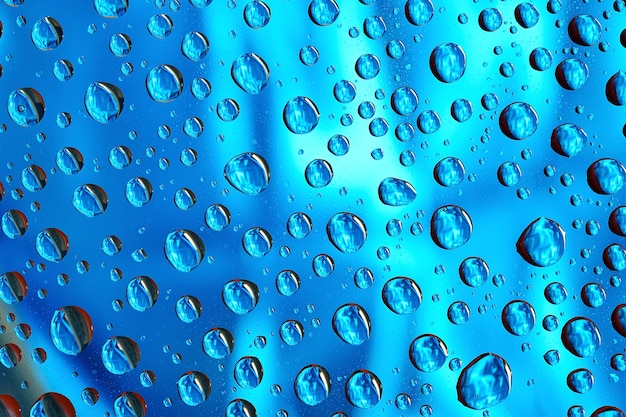 Macro di gocce d'acqua su sfondo blu