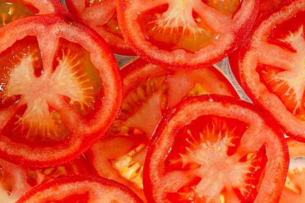 Macro Pomodori Fette di pomodoro Sfondo naturale con fettine di pomodoro