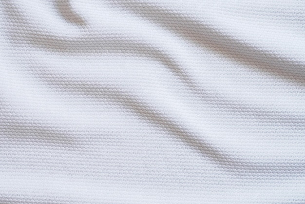 Maglia da calcio bianca abbigliamento tessuto trama abbigliamento sportivo sfondo primo piano