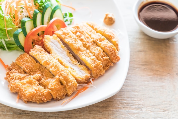 maiale fritto con verdure cotte