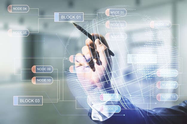 Male hand with pen working with abstract virtual coding illustration and world map on blurred office background international software development concept Multiexposure