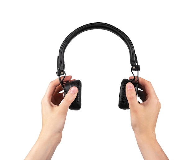 Mani che tengono le cuffie isolate su sfondo bianco Cuffie Bluetooth Accessori per lo studio del tempo libero