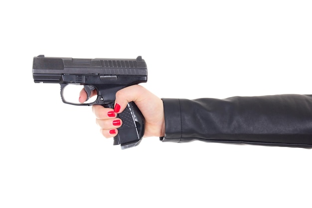 Mani femminili con pistola isolate su bianco