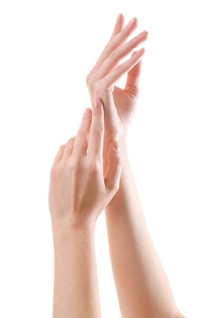 Mani femminili isolate su bianco