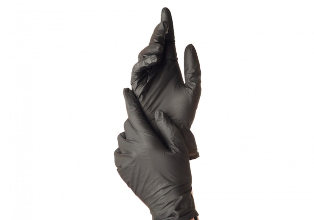 Mani in guanti di gomma neri isolati su fondo bianco