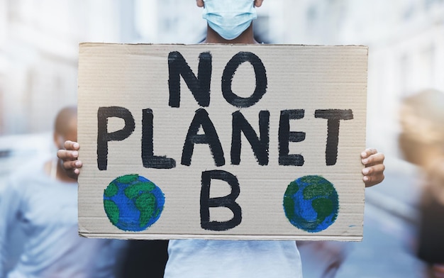 Manifesto di protesta e cambiamento climatico per il cambiamento sociale con motivazione alla responsabilità ambientale Segno di attivismo della campagna di sensibilizzazione sul riscaldamento globale e sull'inquinamento con una premurosa dichiarazione politica