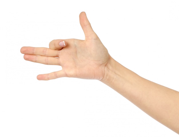 Mano della donna che gesturing come la testa di cane