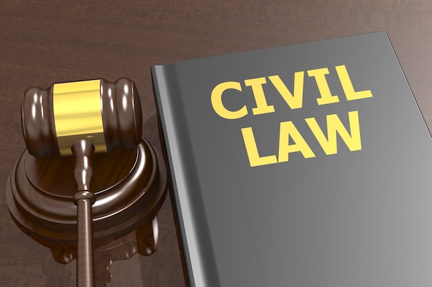 Martelletto del giudice con la parola di diritto civile sul libro