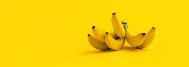 Mazzo di banane sullo spazio giallo