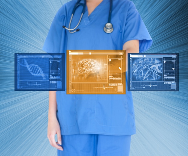 Medico utilizzando touchscreen su sfondo blu