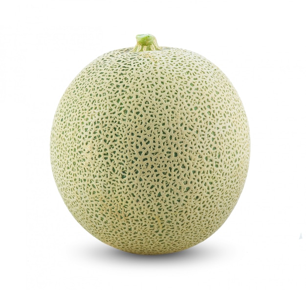 Melone cantalupo sulla parete bianca.