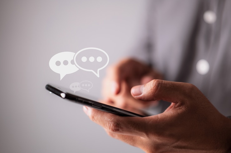 Photo men hands are typing on their smartphones concept of social media marketing technology