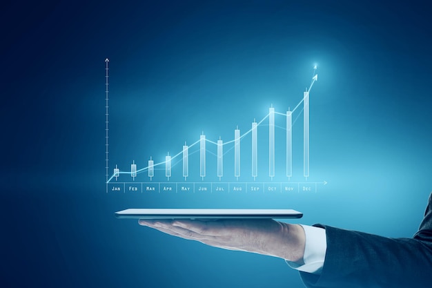 Mercato Forex e concetto di investimento aziendale con indicatori di azioni finanziarie in crescita virtuale sopra la tavoletta digitale sulla mano dell'uomo