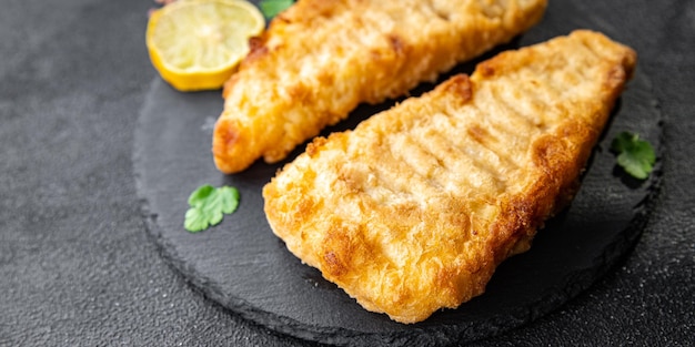 merluzzo pesce fritto in pastella deliziosi frutti di mare pasto sano cibo spuntino sul tavolo copia spazio cibo