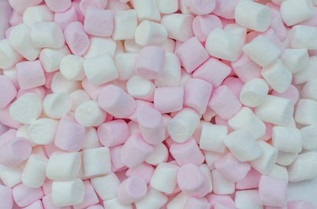 Mini rosa e bianco marshmallows sfondo