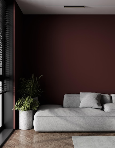 Mockup di parete interna in colore rosso scuro con divano basso in soggiorno con rendering 3D di sfondo a parete vuota