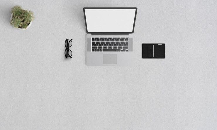 Mockup per laptop Prenota carta bianca texture sfondo isolato sfondo bianco