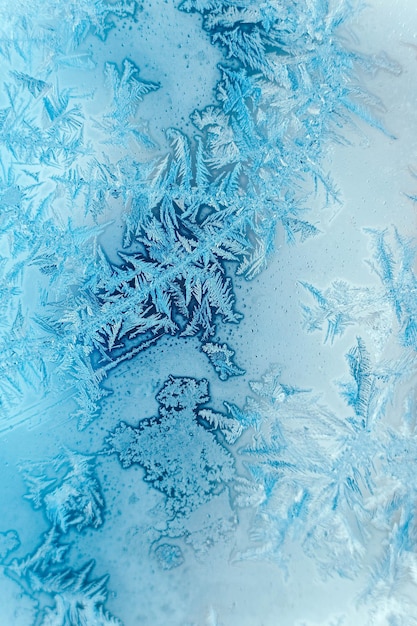 Modelli di ghiaccio sul vetro congelato Modello astratto di ghiaccio sul vetro invernale come immagine di sfondo