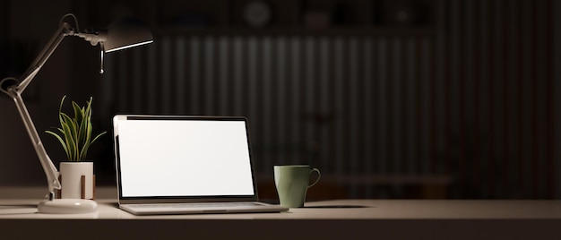 Modello del computer portatile dello schermo bianco nella rappresentazione scura moderna della stanza 3d dell'ufficio