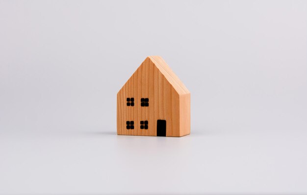 Modello di casa in legno, casa giocattolo, primo progetto di casa e prestito immobiliare e alloggio