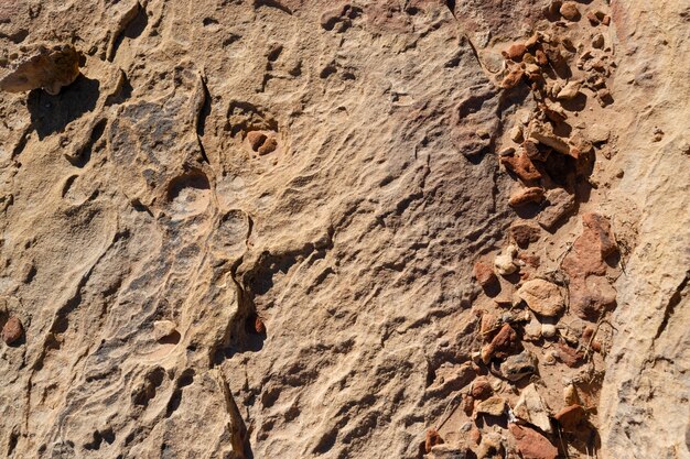 Modello marrone arancio naturale delle montagne del Medio Oriente, pietre strutturate del deserto antico