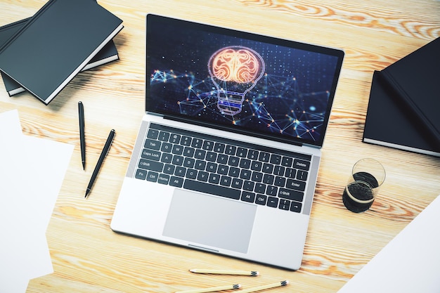Modern computer monitor with creative light bulb hologram with human brain idea and brainstorming concept 3D Rendering