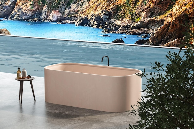 Moderna vasca da bagno beige con rubinetto nero, tavolo con accessori, pavimento in cemento e vista mare