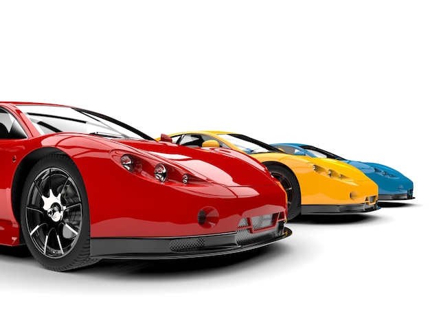Moderne super auto sportive nei colori primari rosso giallo e blu primo piano