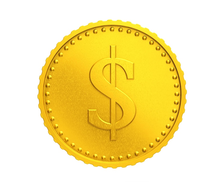 Foto moneta d'oro con il simbolo del dollaro su sfondo bianco