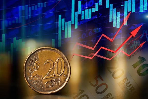 Moneta da venti centesimi sullo sfondo del grafico del mercato azionario su sfondo blu