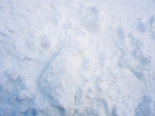 Morbida neve bianca a terra per lo sfondo