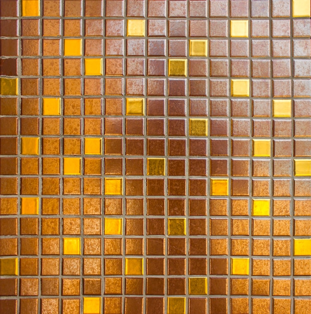 Mosaico quadrato giallo dorato per la decorazione della parete. Sfondo, trama