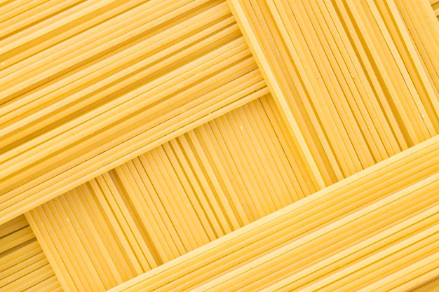 Motivo geometrico rettangolare della bavette per pasta Immagine di sfondo della pasta di grano duro