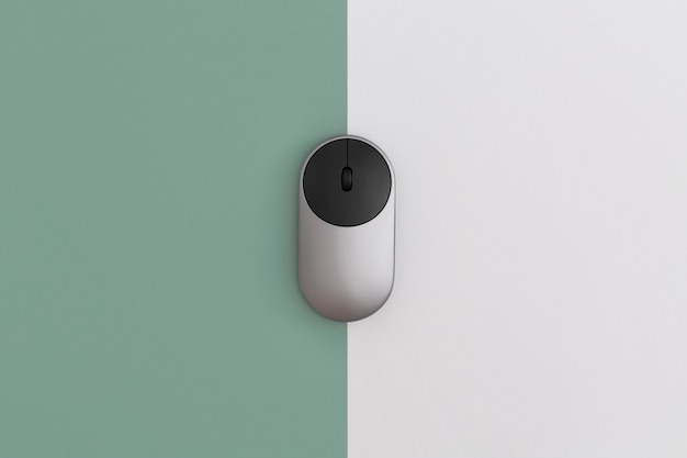 Mouse per computer wireless su sfondo colorato, concetto di tecnologia