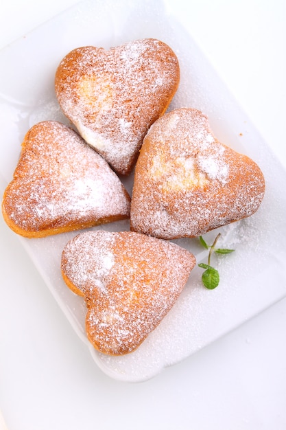 Muffin a forma di cuore con zucchero a velo