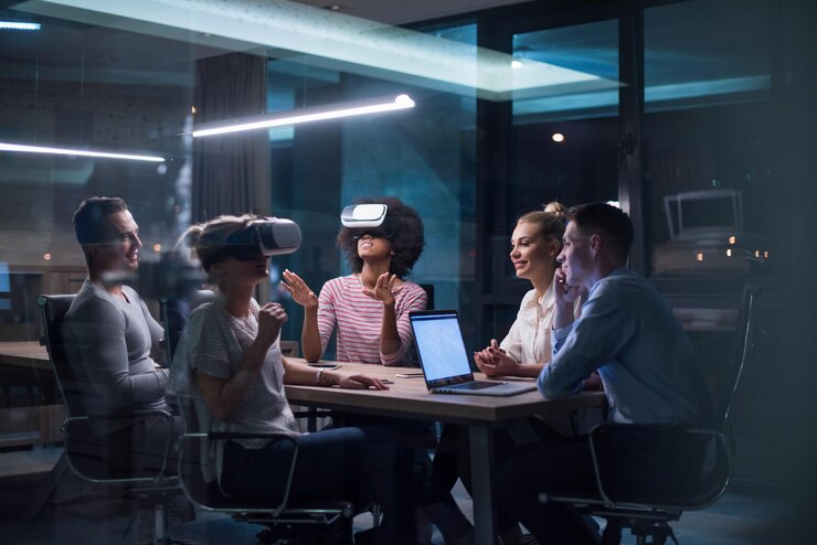 Photo multiethnic business team using virtual reality headset in night office meeting  developers meeting with virtual reality simulator around table in creative office.