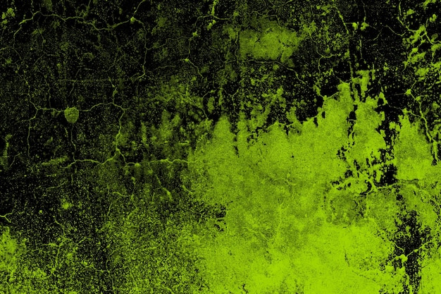 Muro di cemento abbandonato dipinto di verde astratto con struttura e crepe scure del grunge