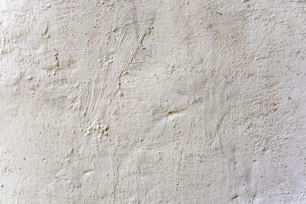 Muro di cemento fatto a mano dipinto sfondo bianco muro bianco carta da parati