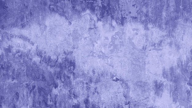 Muro di cemento leggero con vernice scrostata. Estratto vintage grunge colorato in uno sfondo di colore viola alla moda