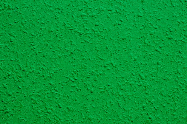 Muro di cemento verde chiaro per interni, carta da parati artistica o sfondo texture artistica