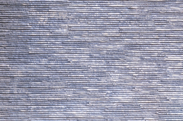 Muro di mattoni bianchi con sfumature di grigio chiaro sullo sfondo di struttura della superficie del modello senza cuciture
