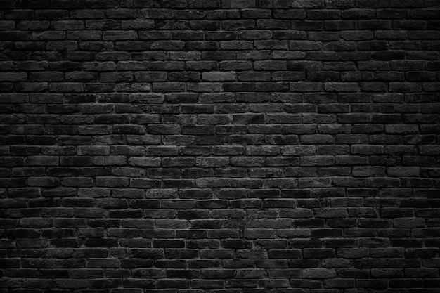 Muro di mattoni nero, sfondo scuro per il design